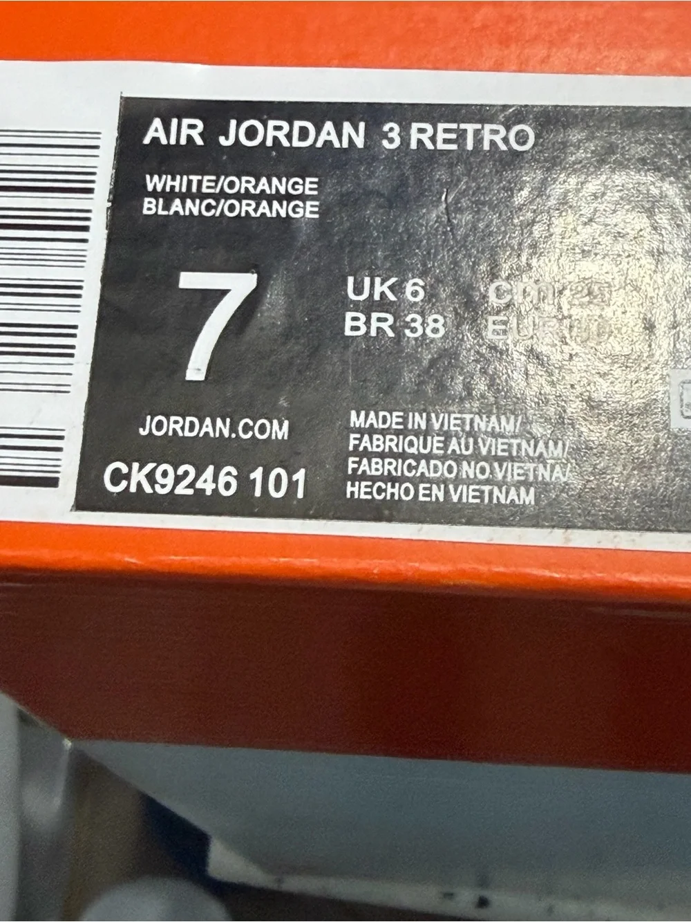 Jordan White and Orange Retro Basketball Sneakers